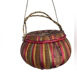 Lidded basket with handles